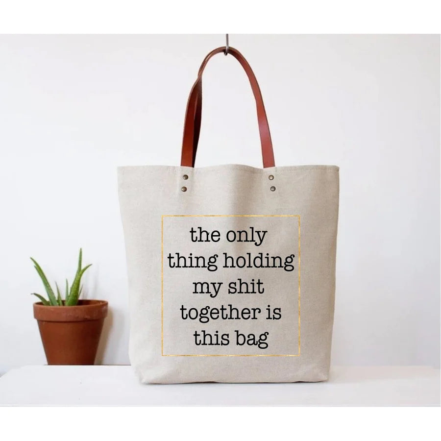 Holding my $h!t together Tote Bag